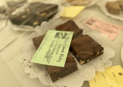 4 chocolate brownies in the baking section of the exhibition tent