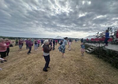 people on the show field doing Paracise session